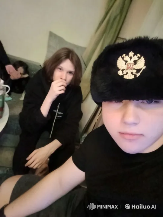 Intimate Moment: Two Individuals Sharing Affection in Cozy Room – AI Generated Video | Hailuo AI