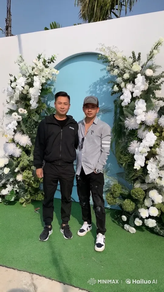 Casual Duo in Elegant Floral Setting – AI Generated Video | Hailuo AI