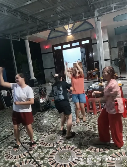 Energetic Dancers Celebrate on Decorated Patio – AI Generated Video | Hailuo AI