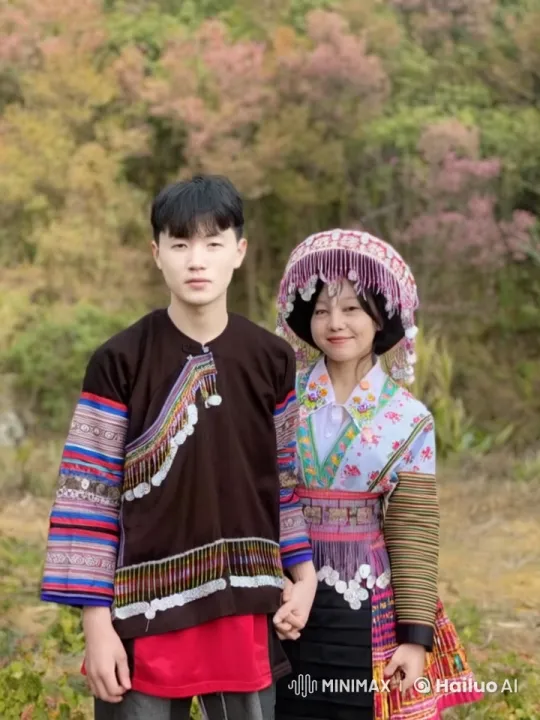 Young Couple in Traditional Attire Amidst Springtime Scenery – AI Generated Video | Hailuo AI