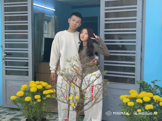 Young Couple Demonstrates Skilled Kungfu in Front of Colorful House – AI Generated Video | Hailuo AI