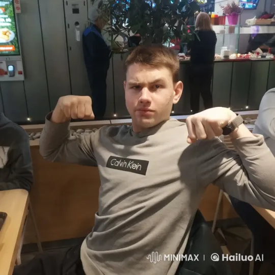 Man Flexes Muscles, Appears to Defy Gravity in Café – AI Generated Video | Hailuo AI