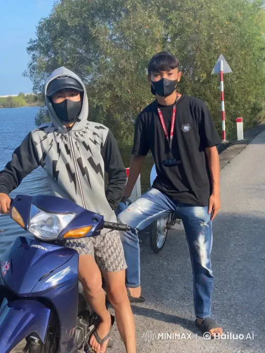 Riverside Relaxation: Young Men Enjoy Nature – AI Generated Video | Hailuo AI