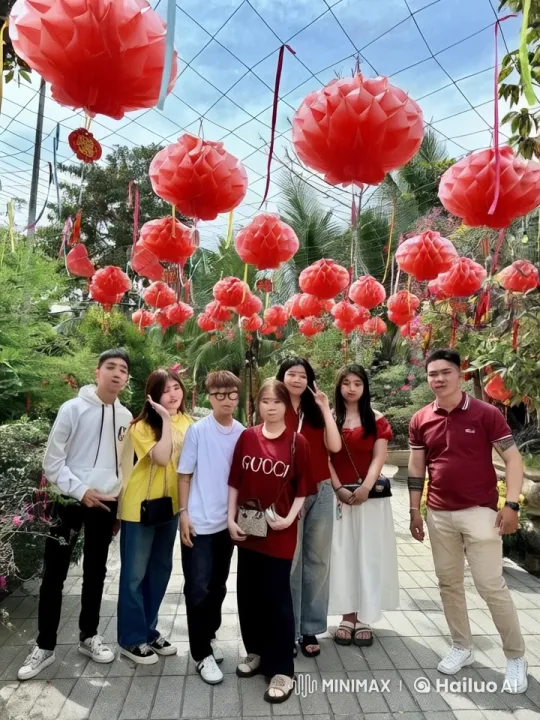 Friends' Playful Mock Fight in Lantern-Adorned Garden – AI Generated Video | Hailuo AI