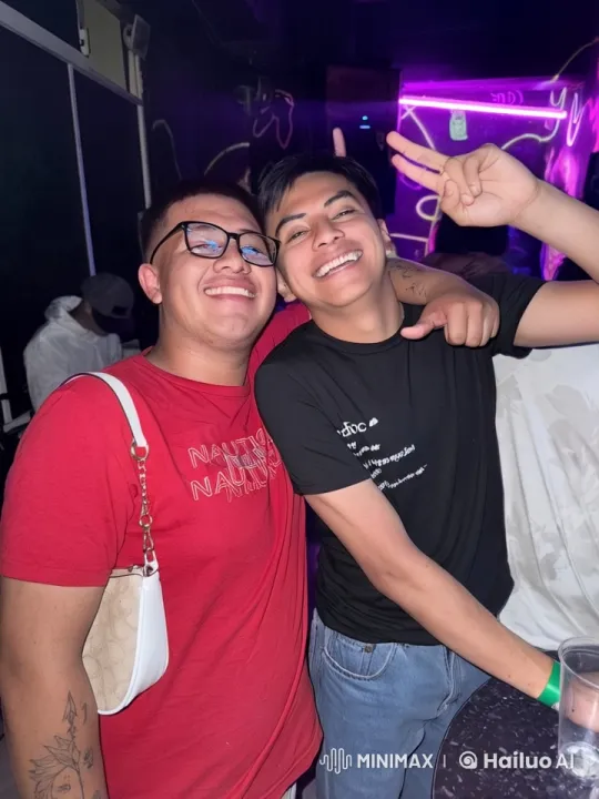 Friends Celebrate at Lively Party with Neon Lights – AI Generated Video | Hailuo AI