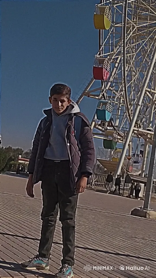 Young Man Smokes in Front of Rotating Ferris Wheel – AI Generated Video | Hailuo AI