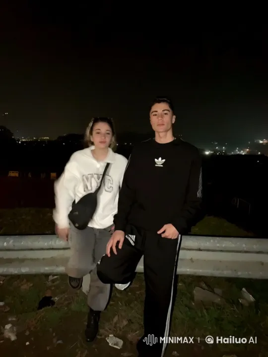Nighttime Calmness: Two Individuals at Dusk – AI Generated Video | Hailuo AI