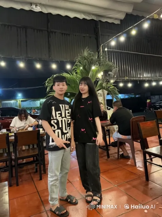 Young Couple Playfully Interacts at Outdoor Restaurant – AI Generated Video | Hailuo AI