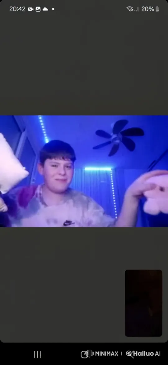 Blue-Lit Room: Playful Toy Kiss – AI Generated Video | Hailuo AI