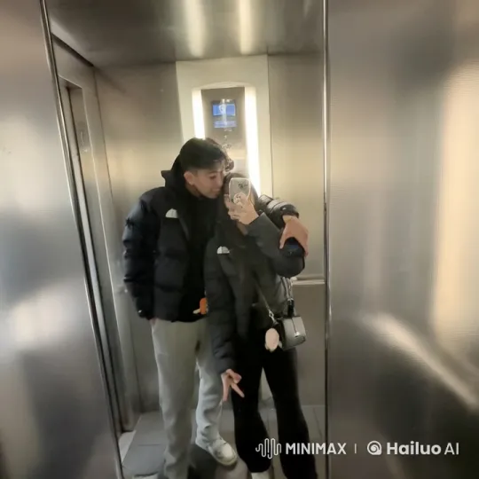 Couple's Playful Fight Captured in Elevator Mirror Selfie – AI Generated Video | Hailuo AI