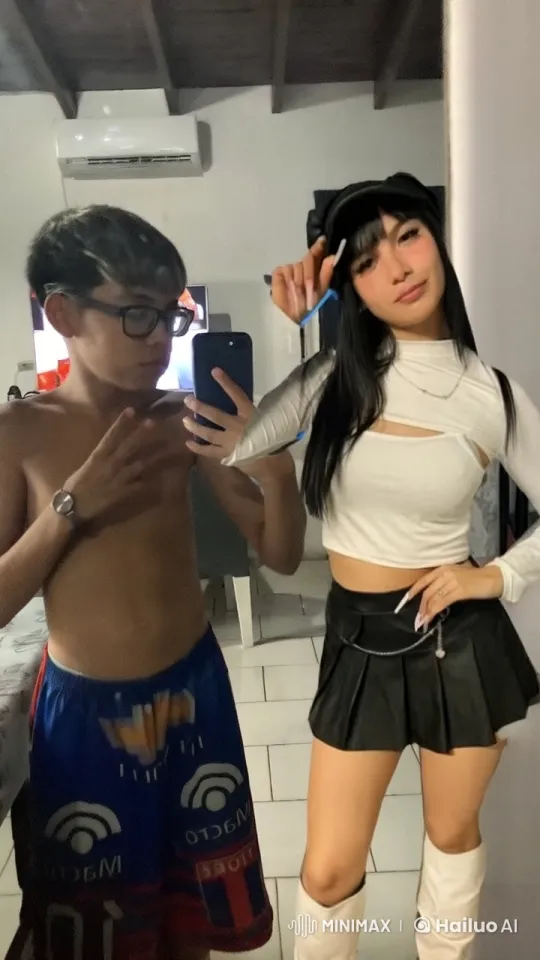 Couple Takes Selfie and Shares a Kiss in Cozy Room – AI Generated Video | Hailuo AI