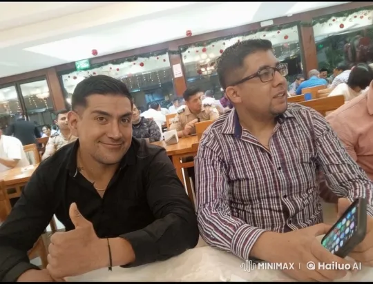 Two Men Enjoying a Meal in a Festive Restaurant – AI Generated Video | Hailuo AI