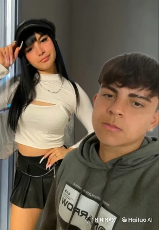 Girl in White Crop Top and Boy in Grey Hoodie Embrace – AI Generated Video | Hailuo AI