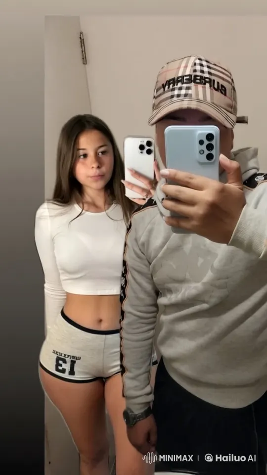 Couple Takes Mirror Selfie, Exchanging Affection – AI Generated Video | Hailuo AI
