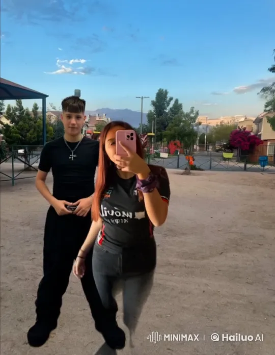Teen Couple Shares Affectionate Moment in Park – AI Generated Video | Hailuo AI