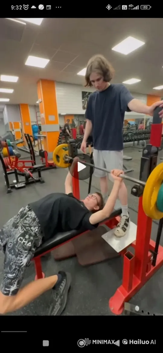 Effortless Bench Press with Safety Spotting in Gym – AI Generated Video | Hailuo AI