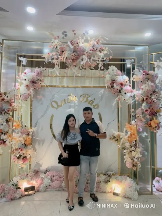 Couple Demonstrates Athletic Kungfu Moves in Floral Setting – AI Generated Video | Hailuo AI