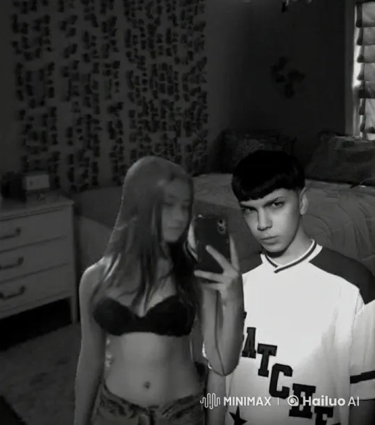 Couple in Bedroom Taking a Romantic Selfie – AI Generated Video | Hailuo AI