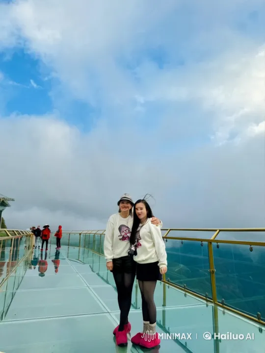 Girls Perform Kungfu on Glass Bridge Amidst Scenic Valley – AI Generated Video | Hailuo AI