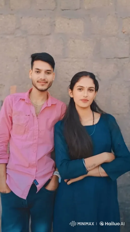 Couple Shares Intimate Moment Against Gray Wall – AI Generated Video | Hailuo AI