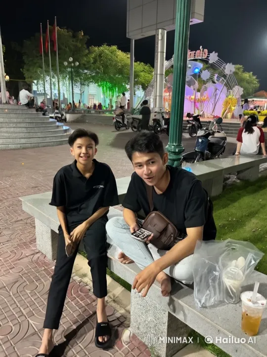 Young Martial Artists Demonstrate Skills in Bustling Evening Setting – AI Generated Video | Hailuo AI