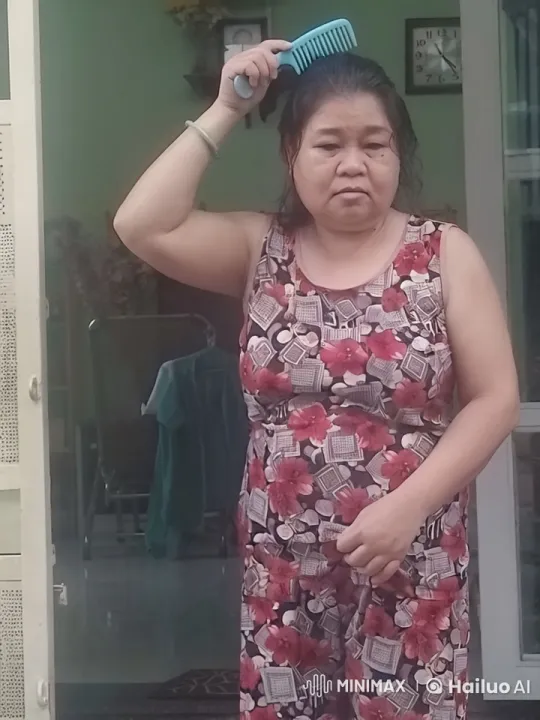 Woman Combs Hair in Calm Home Setting – AI Generated Video | Hailuo AI