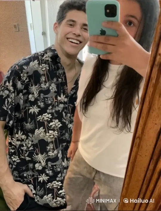 Couple Shares Affectionate Moment in Mirror Selfie – AI Generated Video | Hailuo AI