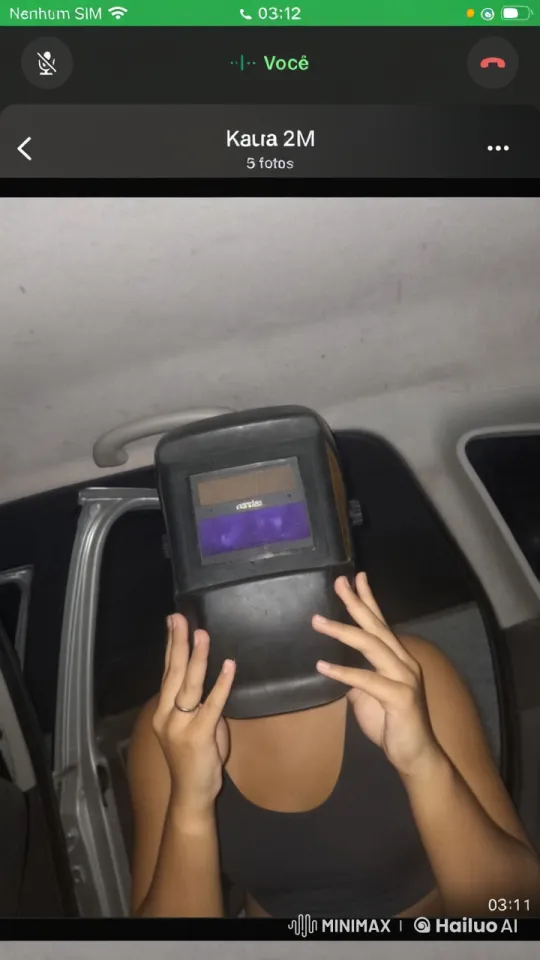 Woman in Car Lifts Hand in L Shape, Reveals Face – AI Generated Video | Hailuo AI