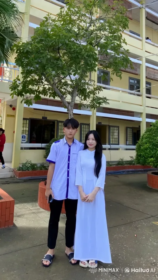 Young Couple Demonstrates Kung Fu in Front of School – AI Generated Video | Hailuo AI