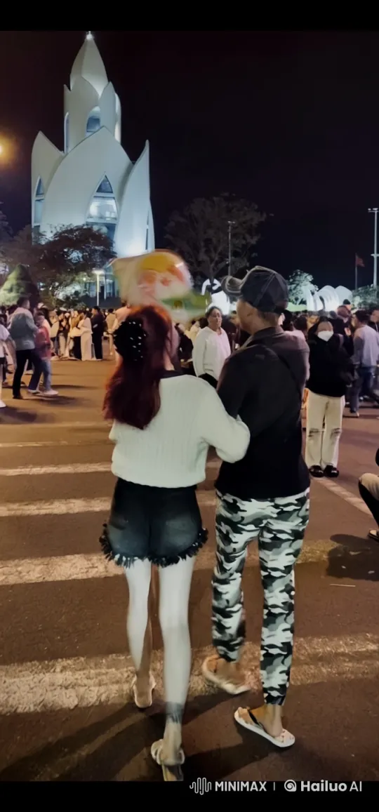 Couple Walks Through Bustling Nighttime Cityscape – AI Generated Video | Hailuo AI