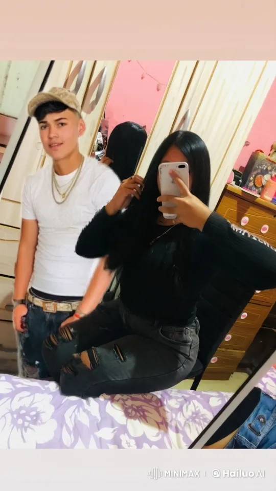 Affectionate Moment Between Young Couple in Bedroom – AI Generated Video | Hailuo AI