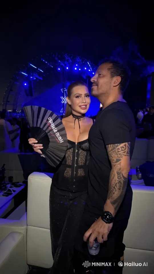 Couple Embraces in Energetic Nightclub Ambiance – AI Generated Video | Hailuo AI