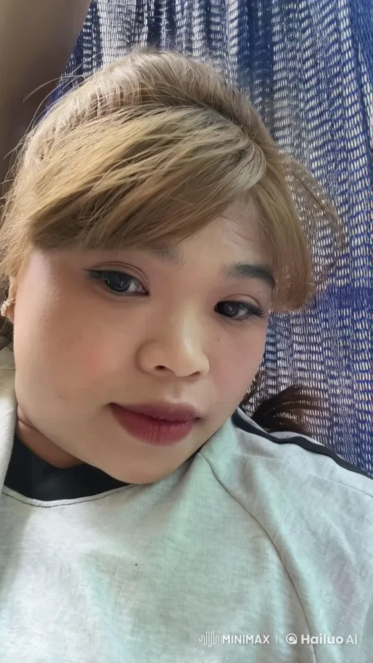 Laughing Person Showcases Blonde Hair Dynamics – AI Generated Video | Hailuo AI