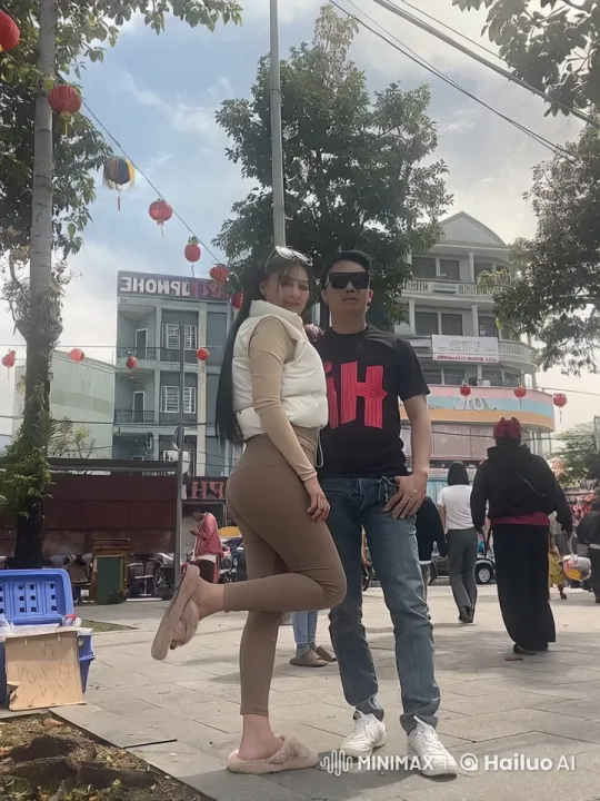 Playful Sparring in Lantern-Decorated Square – AI Generated Video | Hailuo AI