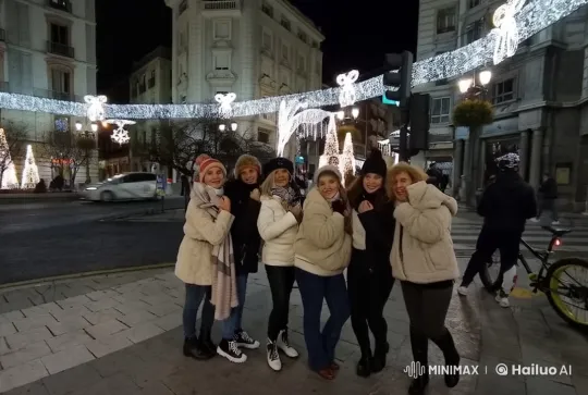 Group of Friends Waves in Festive City Square – AI Generated Video | Hailuo AI