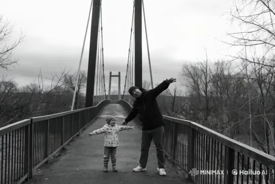 Father and Child Embrace on Suspension Bridge – AI Generated Video | Hailuo AI
