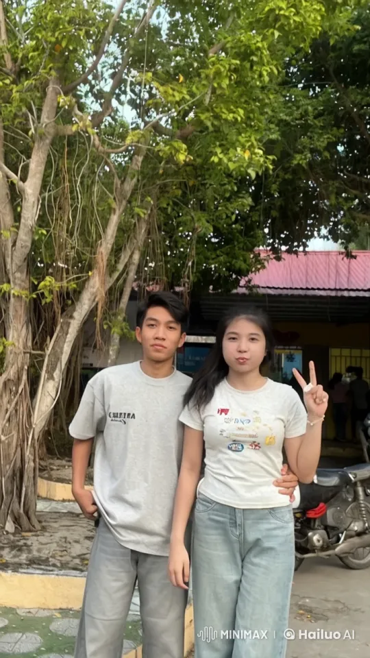 Young Couple Practicing Martial Arts Under a Tree – AI Generated Video | Hailuo AI