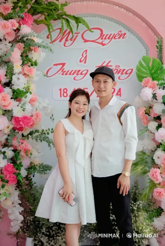 Couple Celebrates with Floral Backdrop on Wedding Day – AI Generated Video | Hailuo AI