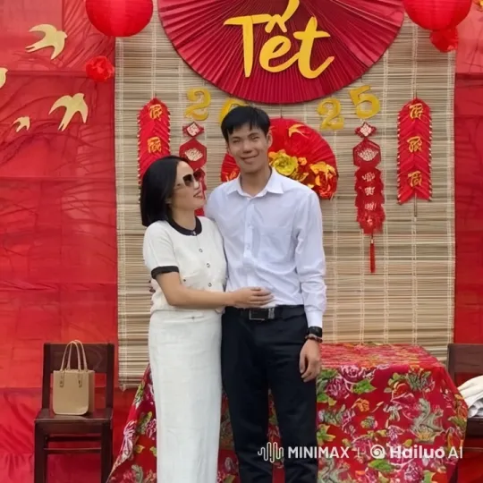 Traditional Attire Couple Showcases Martial Arts at Tet Celebration – AI Generated Video | Hailuo AI