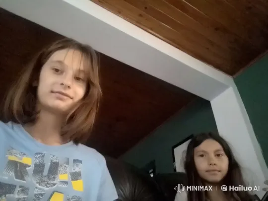 Girls Share Intimate Hug in Cozy Wooden-Roofed Room – AI Generated Video | Hailuo AI