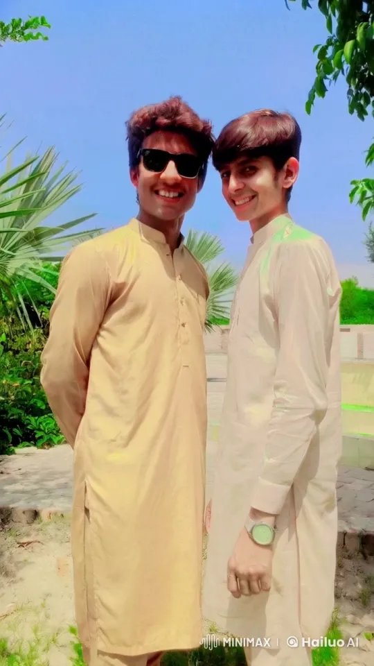 Traditional Attired Men Share a Moment Outdoors – AI Generated Video | Hailuo AI