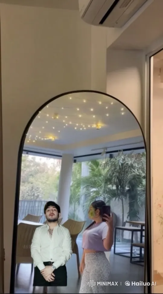 Girl Takes Selfie, Boy Kisses Her in Modern Room – AI Generated Video | Hailuo AI
