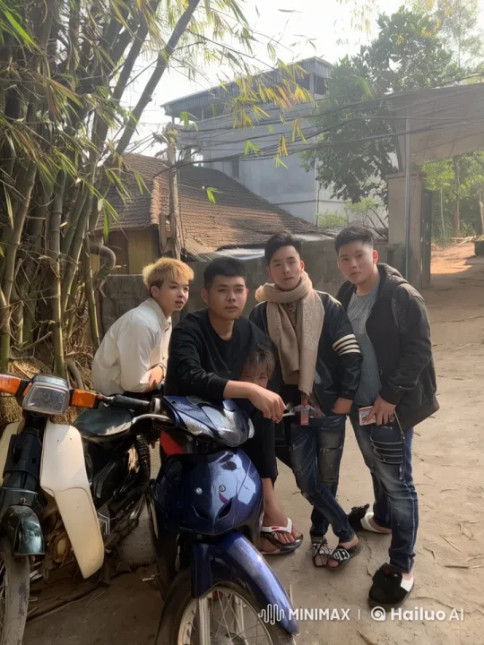 Young Men Bonding Over Motorcycles in Rustic Village Setting – AI Generated Video | Hailuo AI