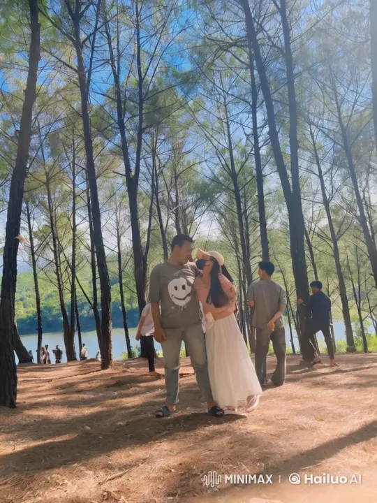Man in Smiley Shirt Fights Vigorously in Serene Forest – AI Generated Video | Hailuo AI