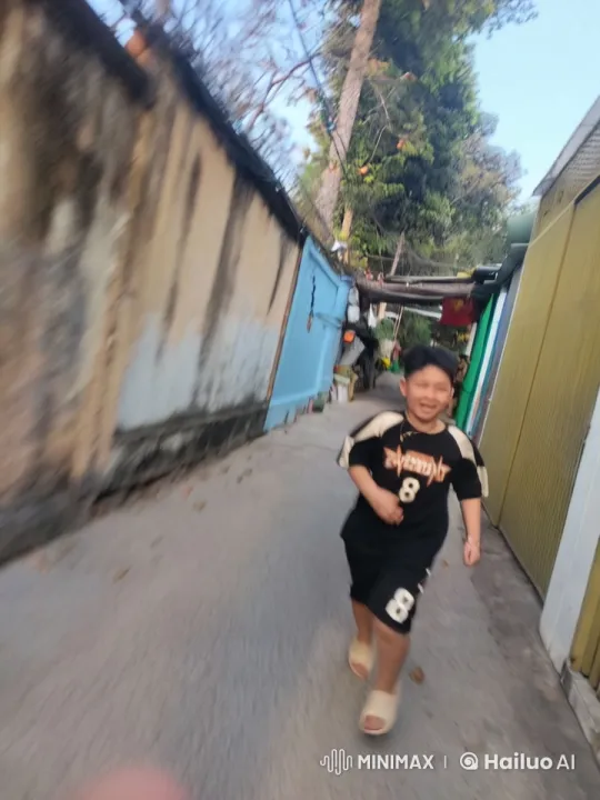 Child in Sports Attire Runs Through Vibrant Alleyway – AI Generated Video | Hailuo AI