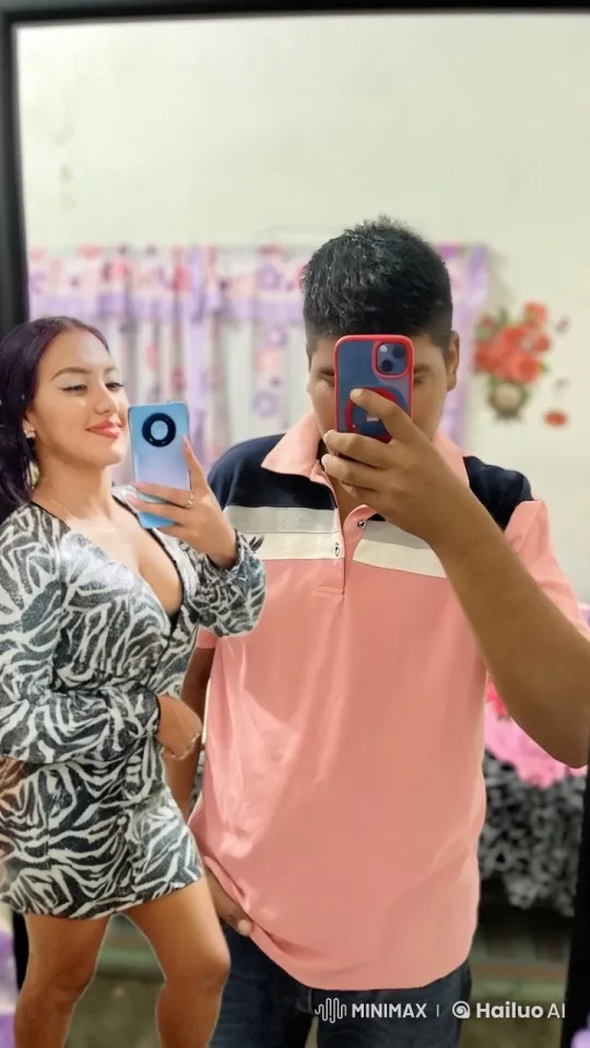Couple Shares Affectionate Moment in Mirror Selfie – AI Generated Video | Hailuo AI
