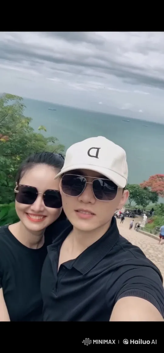 Couple Poses with Dynamic Moves at Ocean Viewpoint – AI Generated Video | Hailuo AI