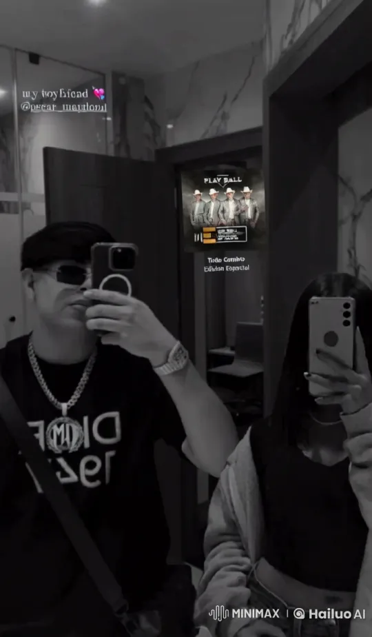 Young Couple Takes Selfie, Shares Kiss in Cozy Setting – AI Generated Video | Hailuo AI
