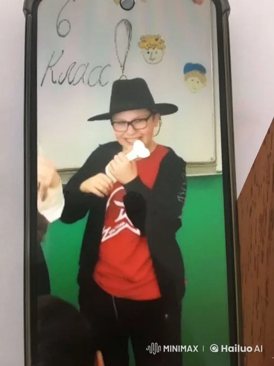 Boy Dances Enthusiastically Amidst Falling Roses in Classroom – AI Generated Video | Hailuo AI
