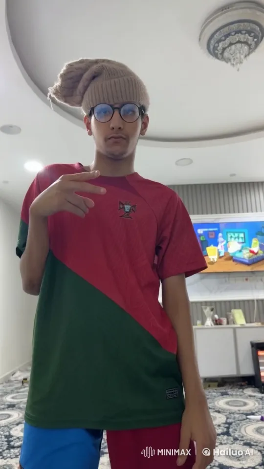 Young Person in Striped Shirt Smoking in Bright Living Room – AI Generated Video | Hailuo AI